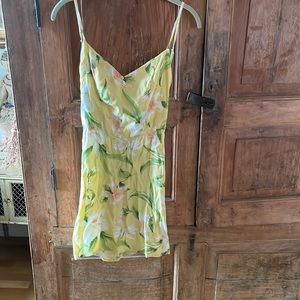 Reformation summer dress waist is 12” across. Backless… length from pit is 25”